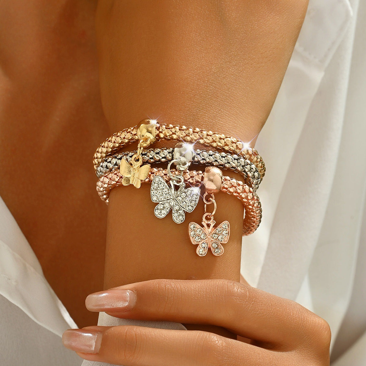 A European and American-border alloy three color set elastic popcorn chain pendant bracelet female